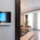 Smart home technology increase property valuation. Smart home integration panel on wall displaying smart products available within the home.